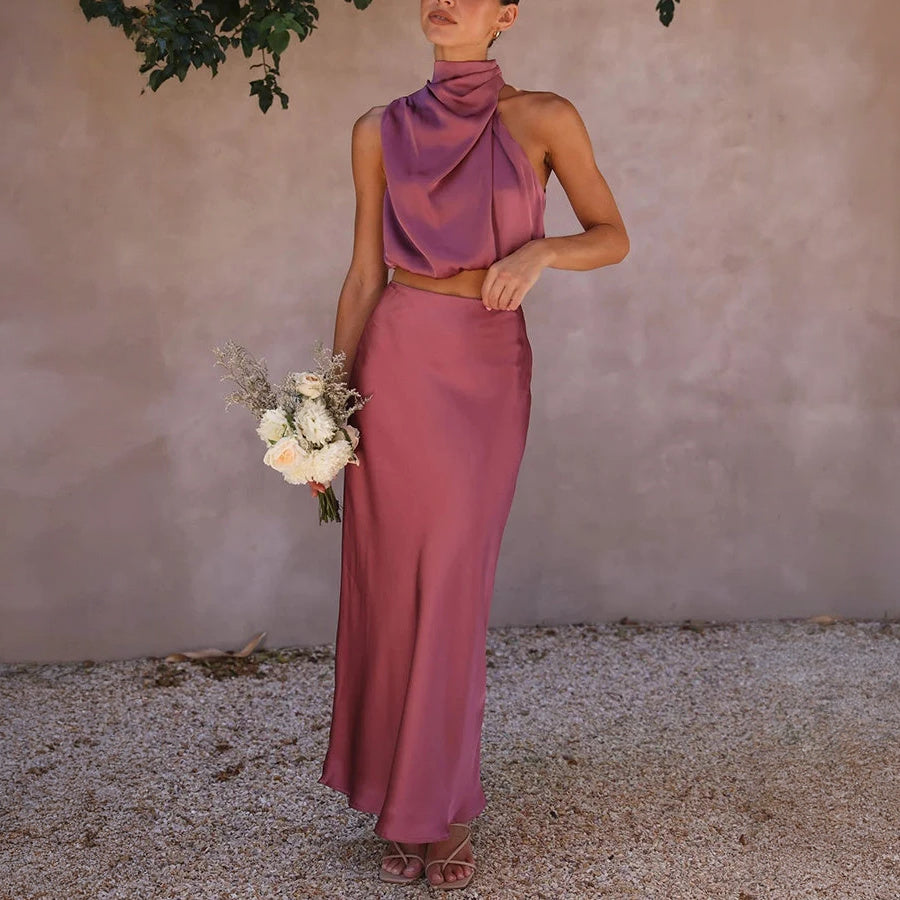 Abito Elegante con Top Halter e Gonna Fluttuante