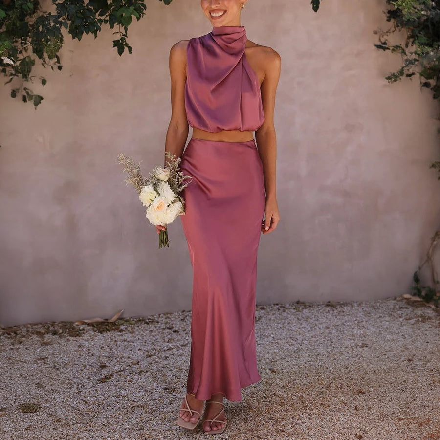 Abito Elegante con Top Halter e Gonna Fluttuante
