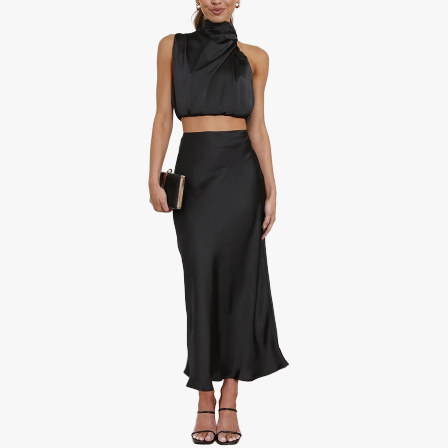 Abito Elegante con Top Halter e Gonna Fluttuante
