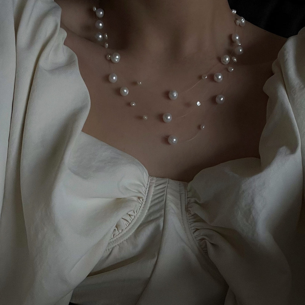 Collana di perle a strati fluttuanti