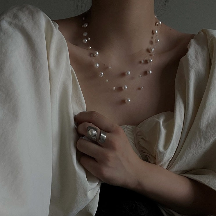 Collana di perle a strati fluttuanti
