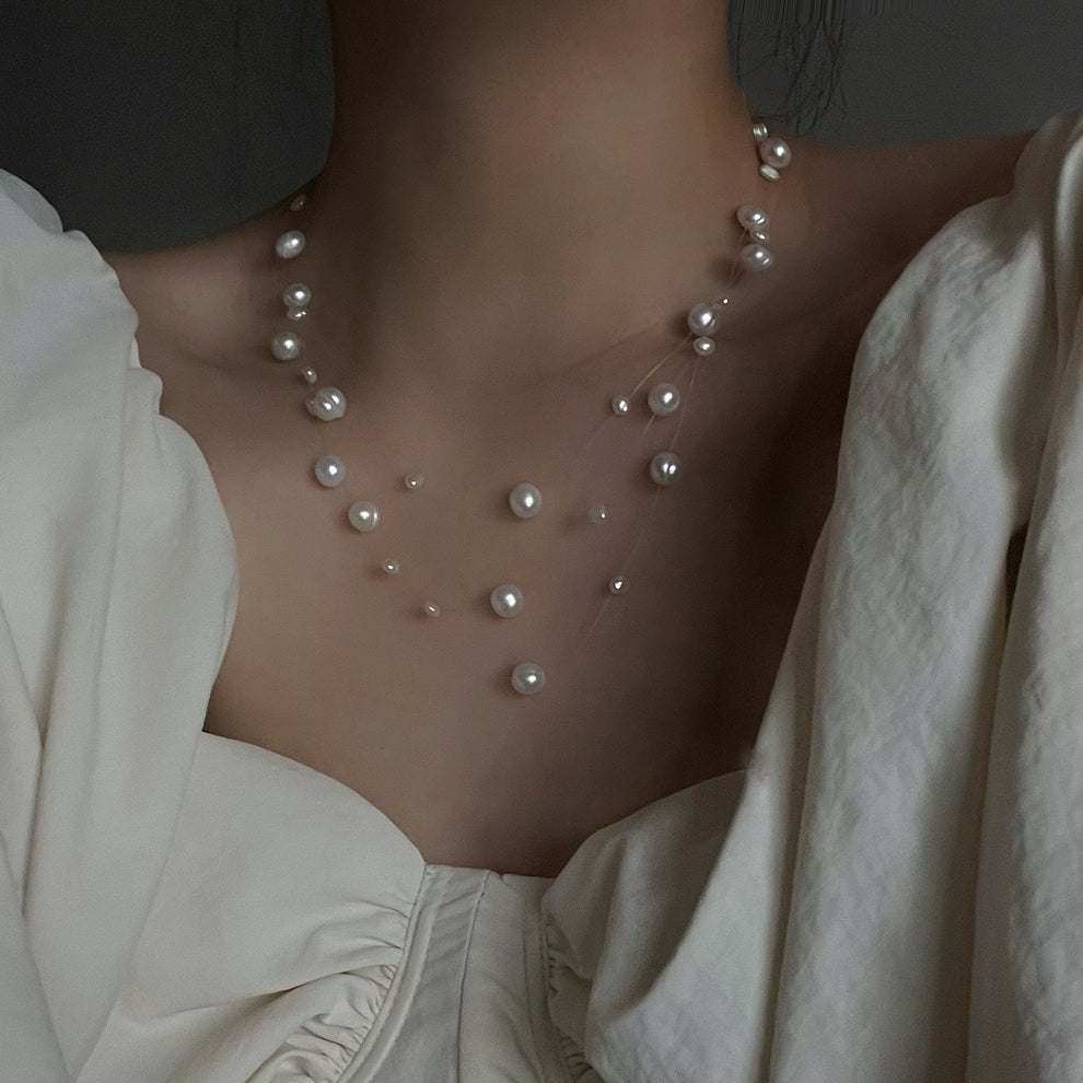 Collana di perle a strati fluttuanti