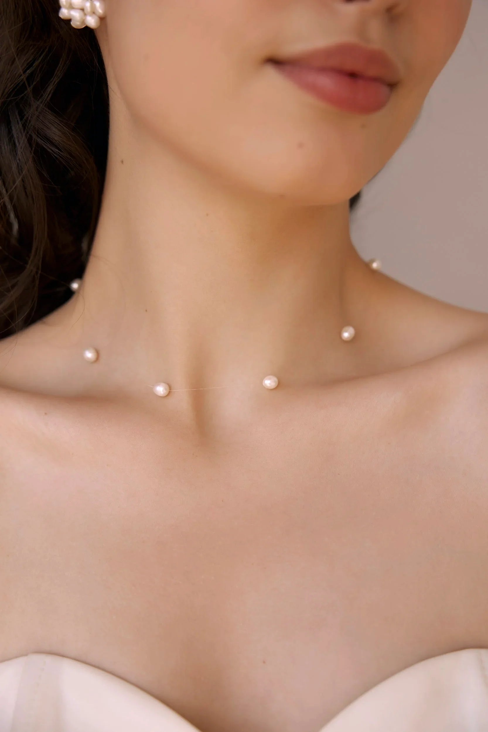 Collana di perle galleggianti