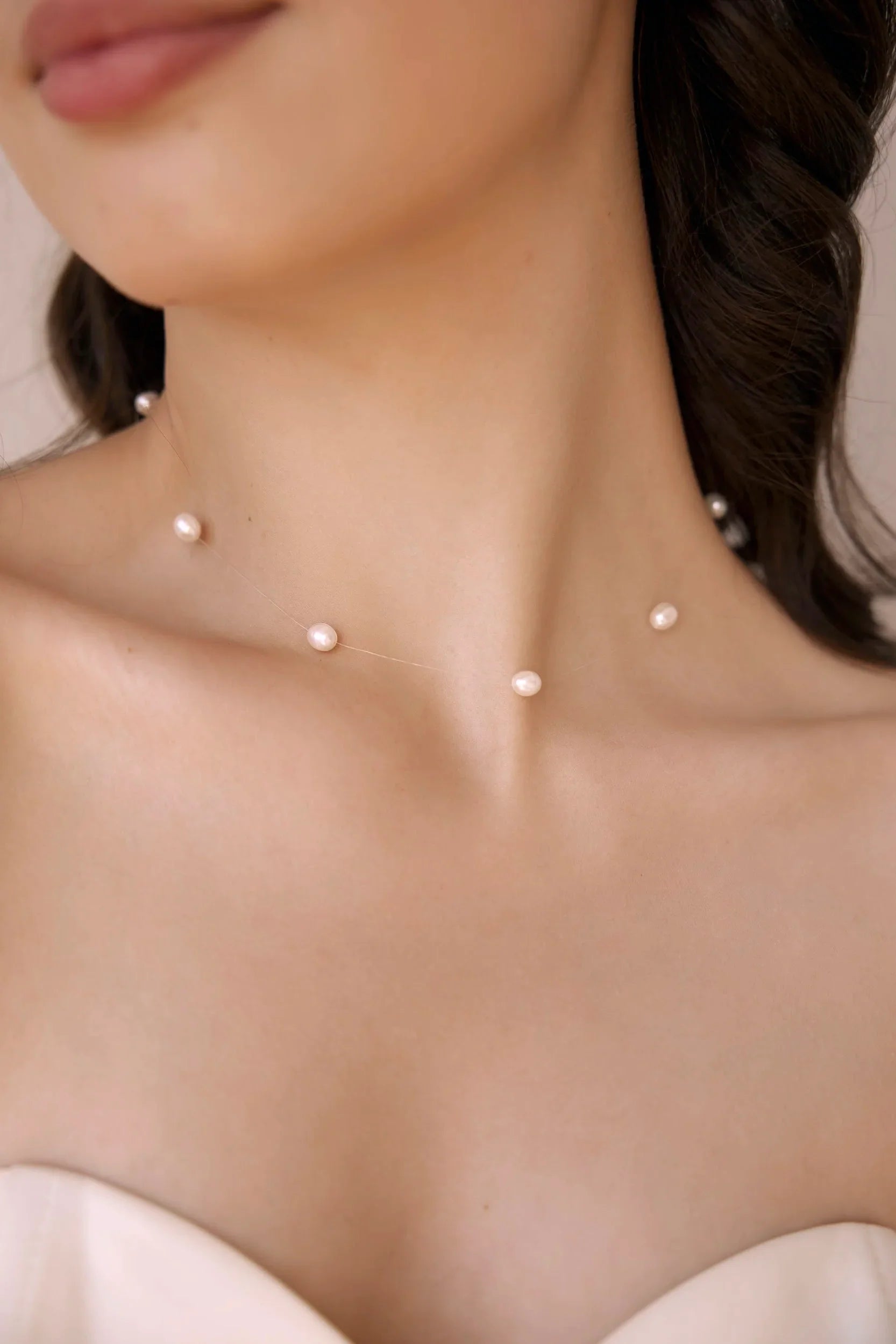 Collana di perle galleggianti