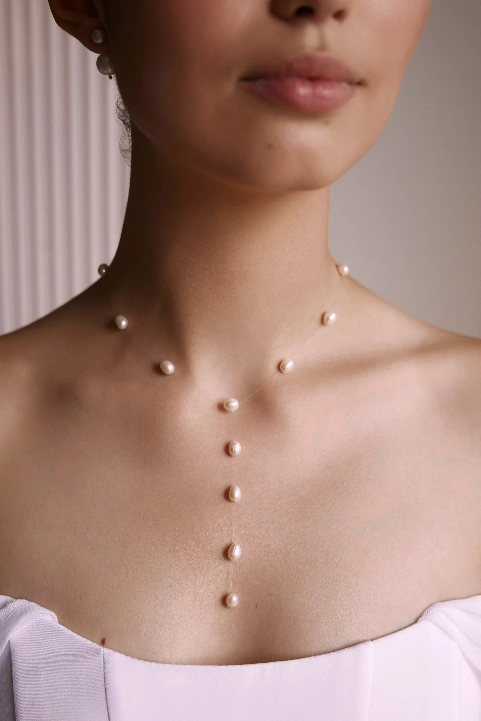 Collana a forma di Y con perle galleggianti