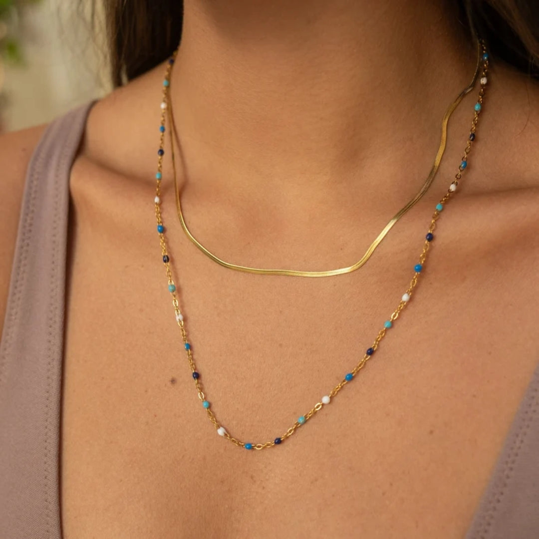 Collana vintage con pietre blu dorate