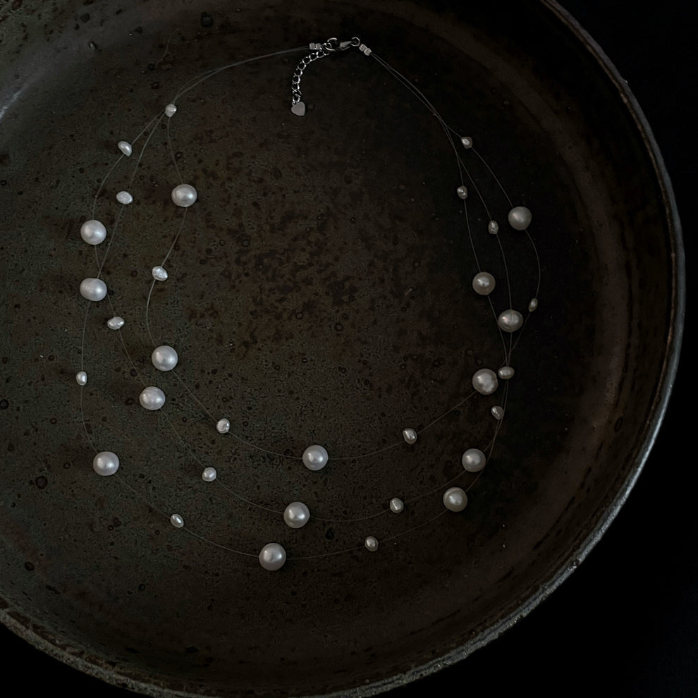 Collana di perle a strati fluttuanti