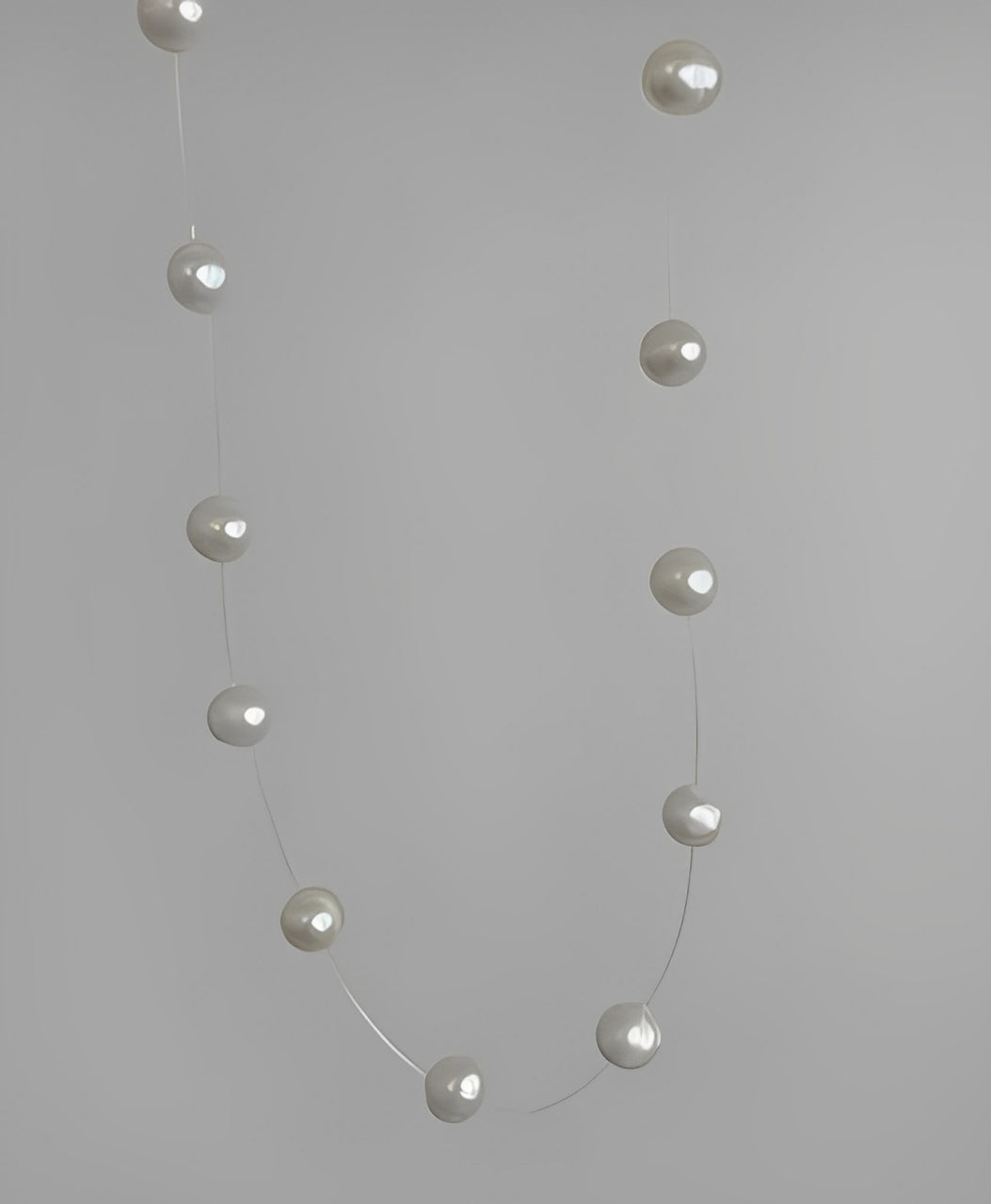 Collana di perle galleggianti