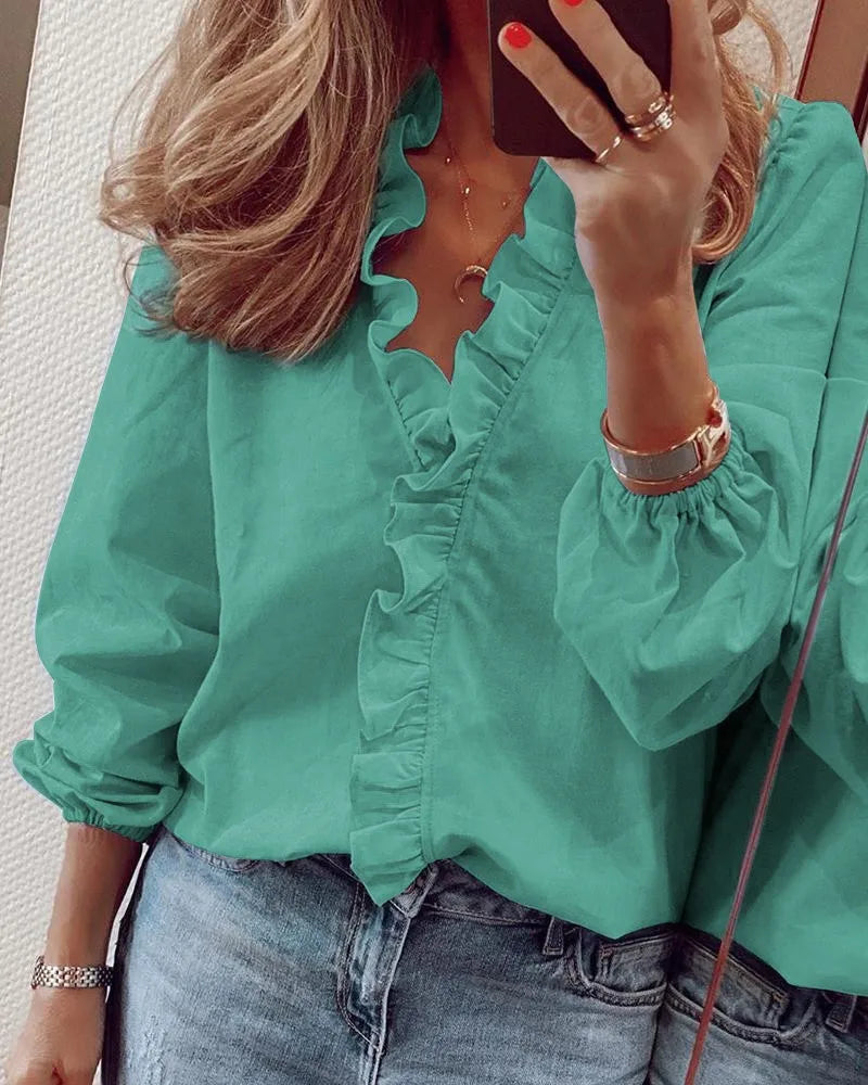 Valeria™ | Blusa con scollo a V e volant delicati