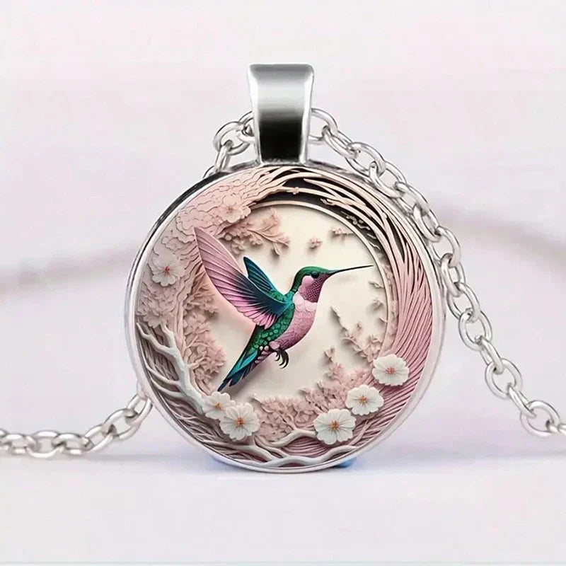 Collana con pendente a cupola in vetro con colibrì