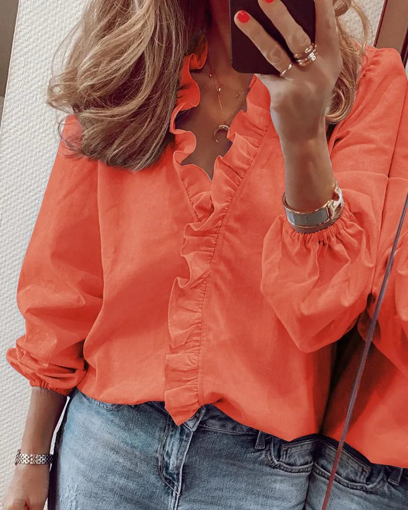 Valeria™ | Blusa con scollo a V e volant delicati